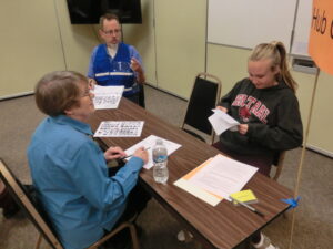 Martha from Ballard has one of the younger role players, who was an enthusiastic participant. Jim, in the blue vest, was one of the exercise Evaluators.